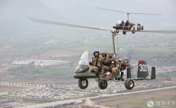 Chinese special forces demo a 'Hunting Eagle' gyrocopter specially modified for parachute assault 