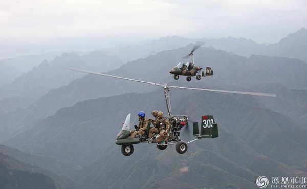 Chinese special forces demo a 'Hunting Eagle' gyrocopter specially modified for parachute assault 