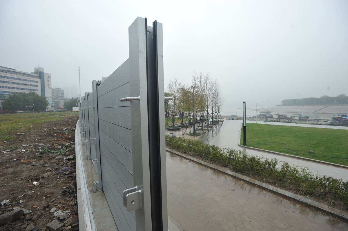 China puts homemade mobile anti-flood walls into use in Wuhan, a vital city by the side of Yangze River, frequently bothered by flooding  