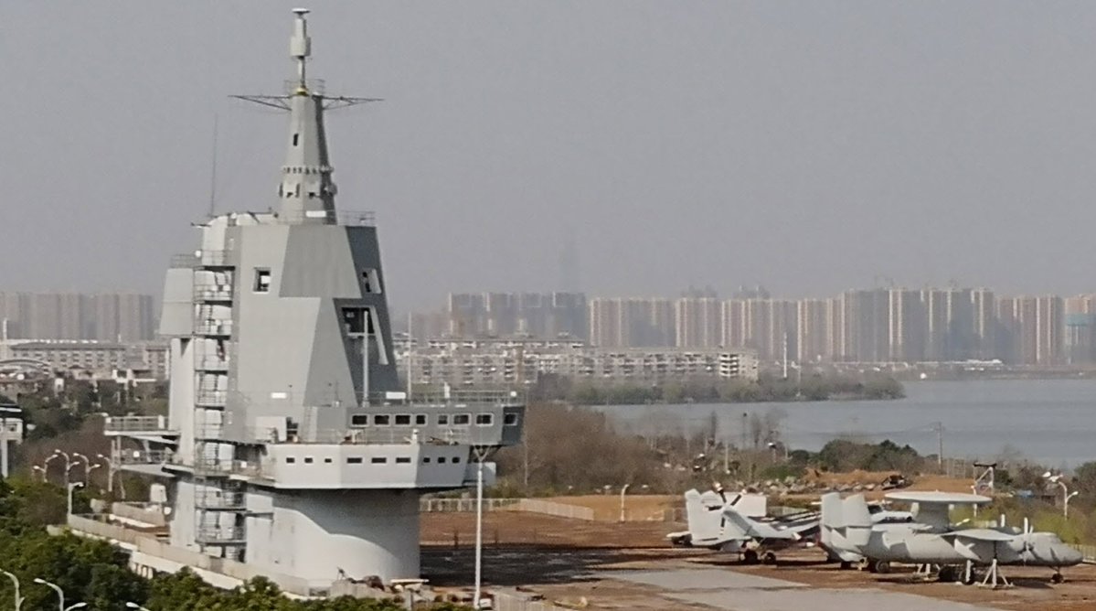 Note evolution of island shaping in Chinese carrier development, Liaoning, CV-001A and carrier testbed being adapted for third carrier.