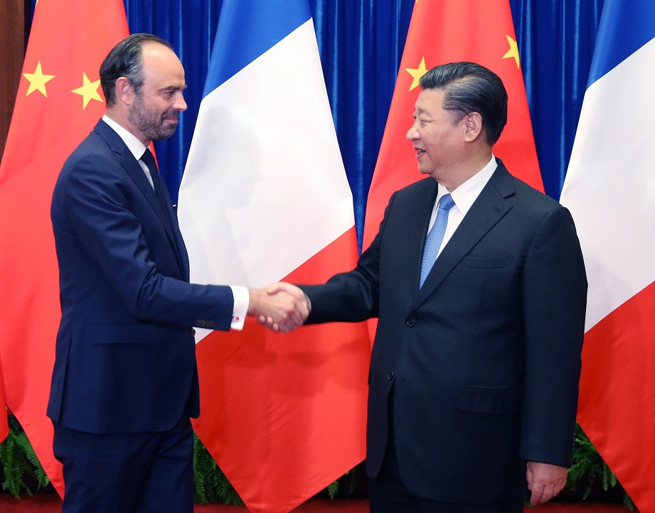 President Xi Jinping on Monday met with French PM Edouard Philippe in Beijing, saying China is willing to work with France to enrich the content of the comprehensive strategic partnership between the two countries