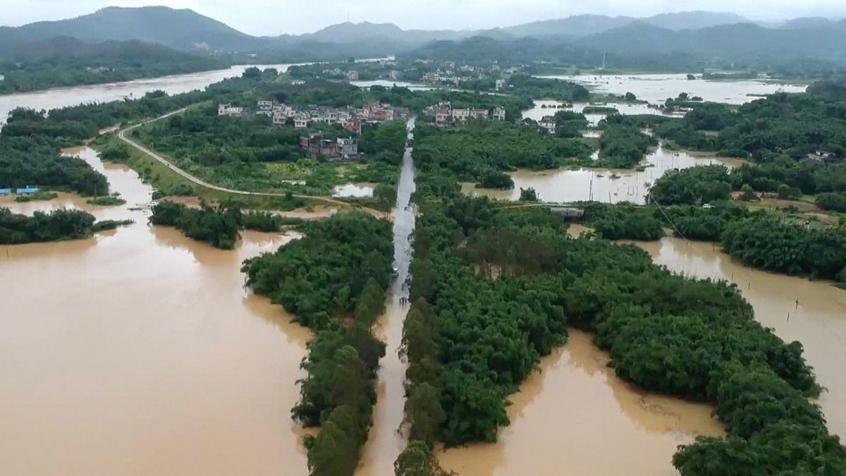 At least two people have died and 136,100 affected after heavy rainstorms flooded 96 towns in south China's Guangdong Province   