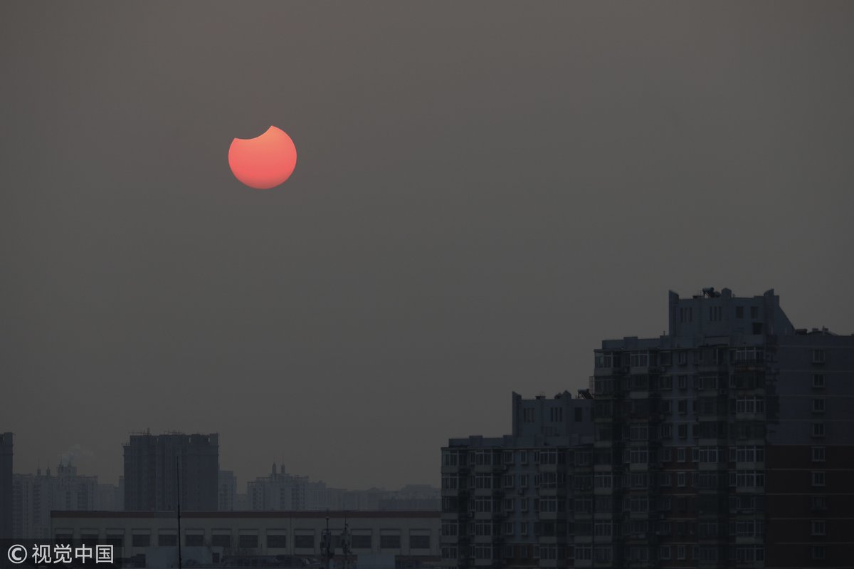 CGTN:The first partial solar eclipse in 2019, captured by photographers in Beijing   