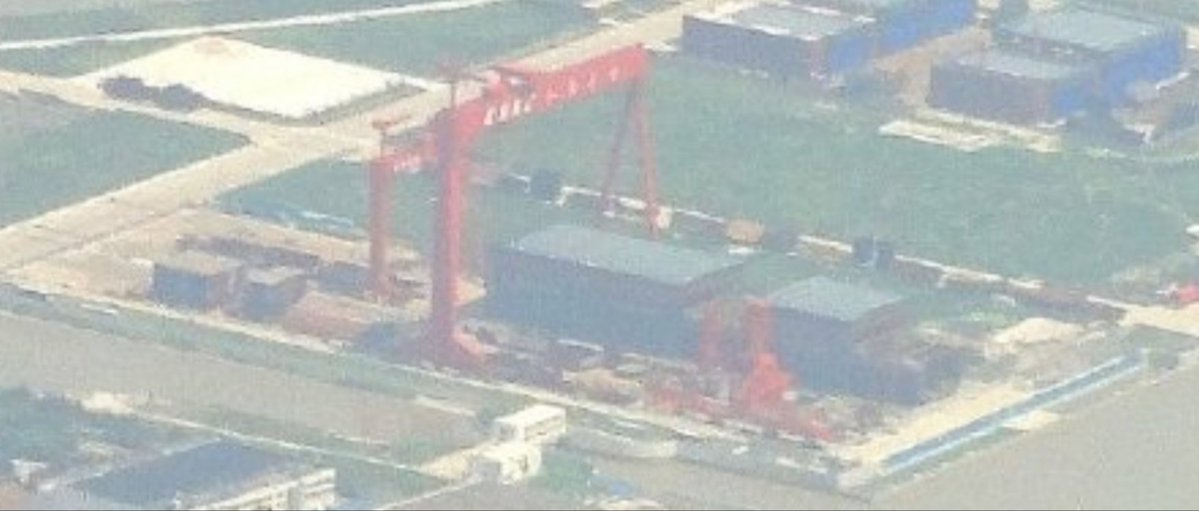 A recent image of the PLAN's Type 003 aircraft carrier under construction at the Jiangnan Shipyard in Shanghai shows that the dredging work continues.  (Image  by78SDF)