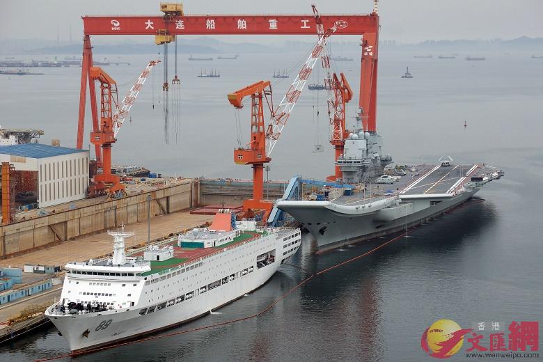 After a longer break again some better images of the PLAN's Type 002 aircraft carrier at Dalian. Quite interesting are the numerous tire marks on deck . so there were some fairly thorough flight testing during the last cruise. 