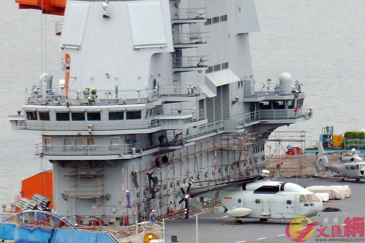 After a longer break again some better images of the PLAN's Type 002 aircraft carrier at Dalian. Quite interesting are the numerous tire marks on deck . so there were some fairly thorough flight testing during the last cruise. 