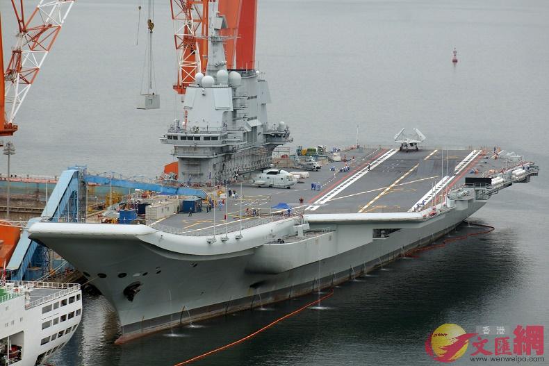 After a longer break again some better images of the PLAN's Type 002 aircraft carrier at Dalian. Quite interesting are the numerous tire marks on deck . so there were some fairly thorough flight testing during the last cruise. 