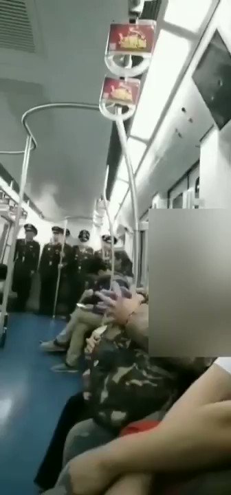 Rows of police on guard inside Beijing Metro trains for security reasons as the 70th anniversary of the PRC is approaching.  