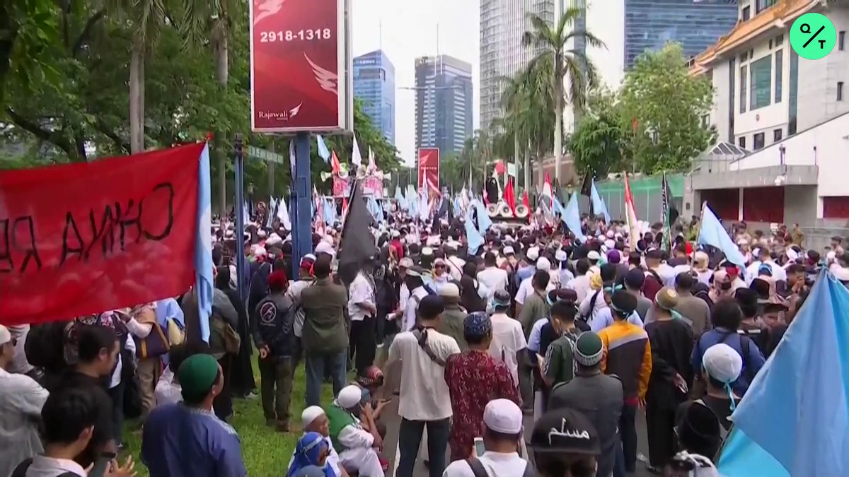 People rally outside the Chinese Embassy in Jakarta, Indonesia protesting China's treatment of Muslim-minority Uighurs