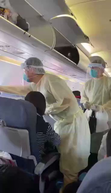 Passengers screened for coronavirus symptoms on a domestic flight out of Wuhan