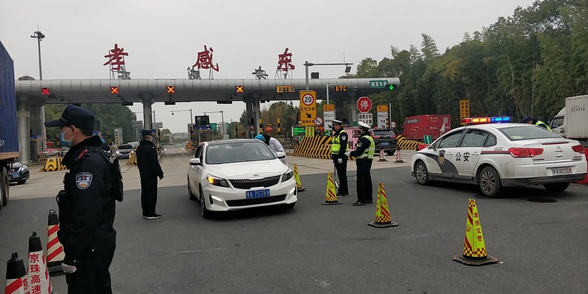Private cars and trucks can freely leave Wuhan, drivers and  passengers get a temperature check. Vehicles also permitted to drive in. Not currently accurate to describe the city as being locked down