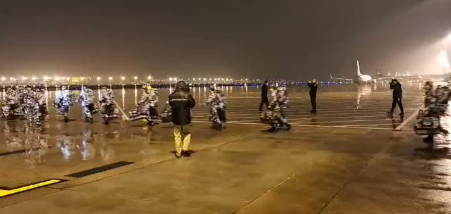 China Army's medical teams are ferried to Wuhan from multiple locations to help local hospitals