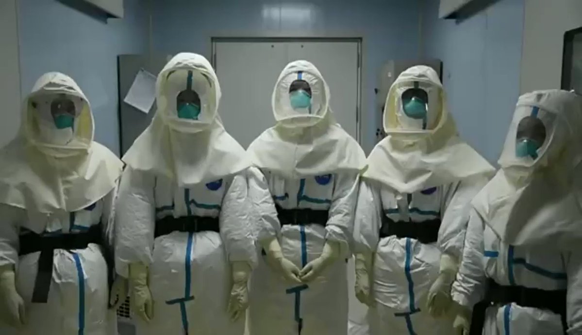 Medical staff at the dedicated isolation ward of Wuhan's People's Hospital wish everyone a Happy New Year, saying: We're here, don't worry [and celebrate Spring Festival] - a hashtag that's   propagated online to ease the coronavirus panic. 