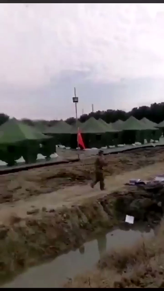 Chinese military has erected a quarantine camp near the Ningbo-Wenzhou highway secured with trenches 