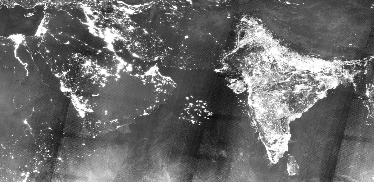 Last night's satellite photo by NASA shows hundreds (if not low thousands) of fishing vessels in the Arabian Sea halfway between Oman and India. They're mostly all from China
