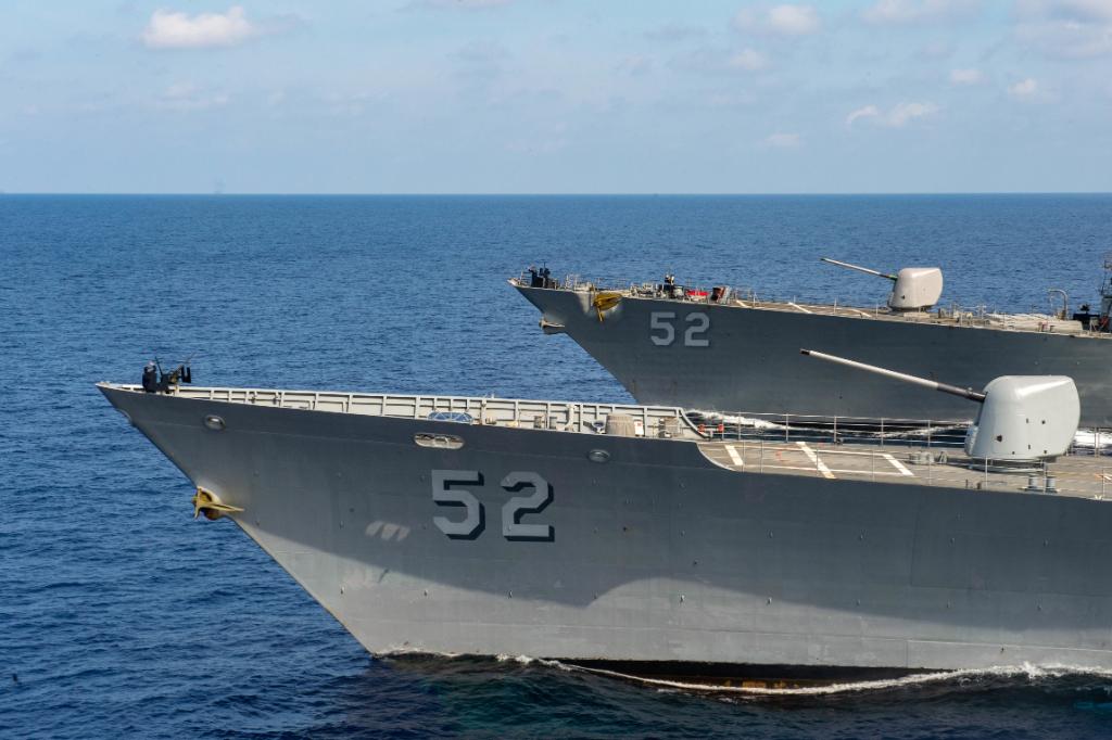 The USNavy's USSBunkerHill, USSBarry, and USSAmerica transit the SouthChinaSea while operating in @US7thFleet as an Expeditionary Strike Group in support of security and stability in the Indo-Pacific region