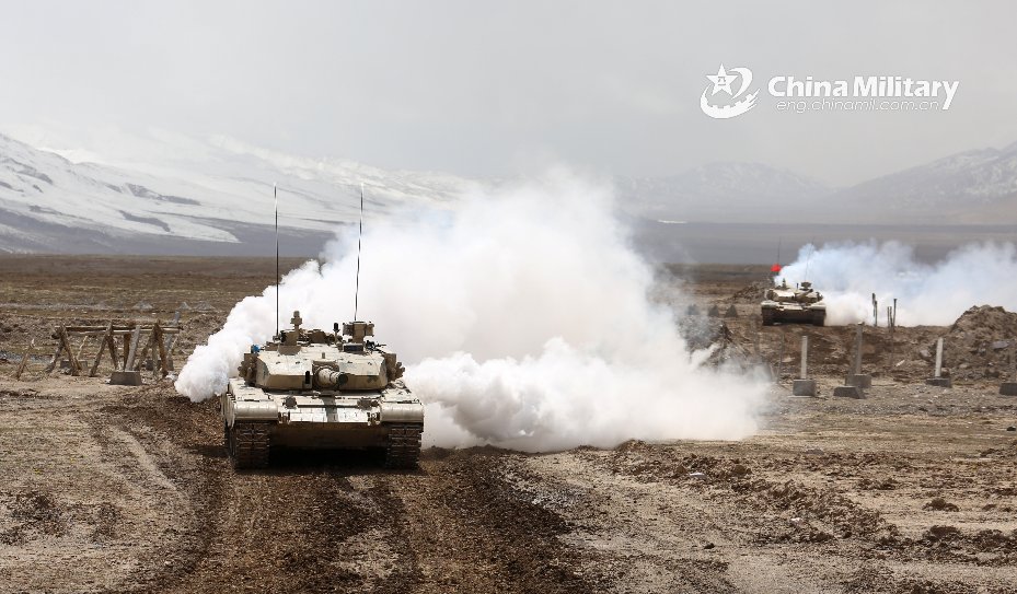 PLA MBTs and IFVs rumble in plateau mountainous area