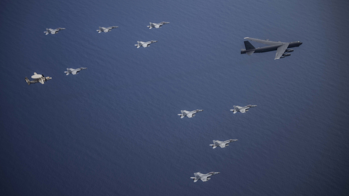 Aircraft from the Nimitz Carrier Strike Force fly in formation with a @USAirForce B-52H Stratofortress during a joint exercise over the South China Sea on Saturday as USSNimitz and USSRonaldReagan conducted dual carrier operations:  -  @PACAF