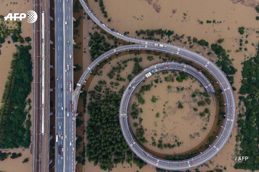 Bridge to nowhere.  A bridge to Tianxingzhou island is cut off by floodwaters from the Yangtze River in Wuhan, in China's central Hubei province