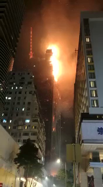 Skyscraper under construction on fire in Hong Kong