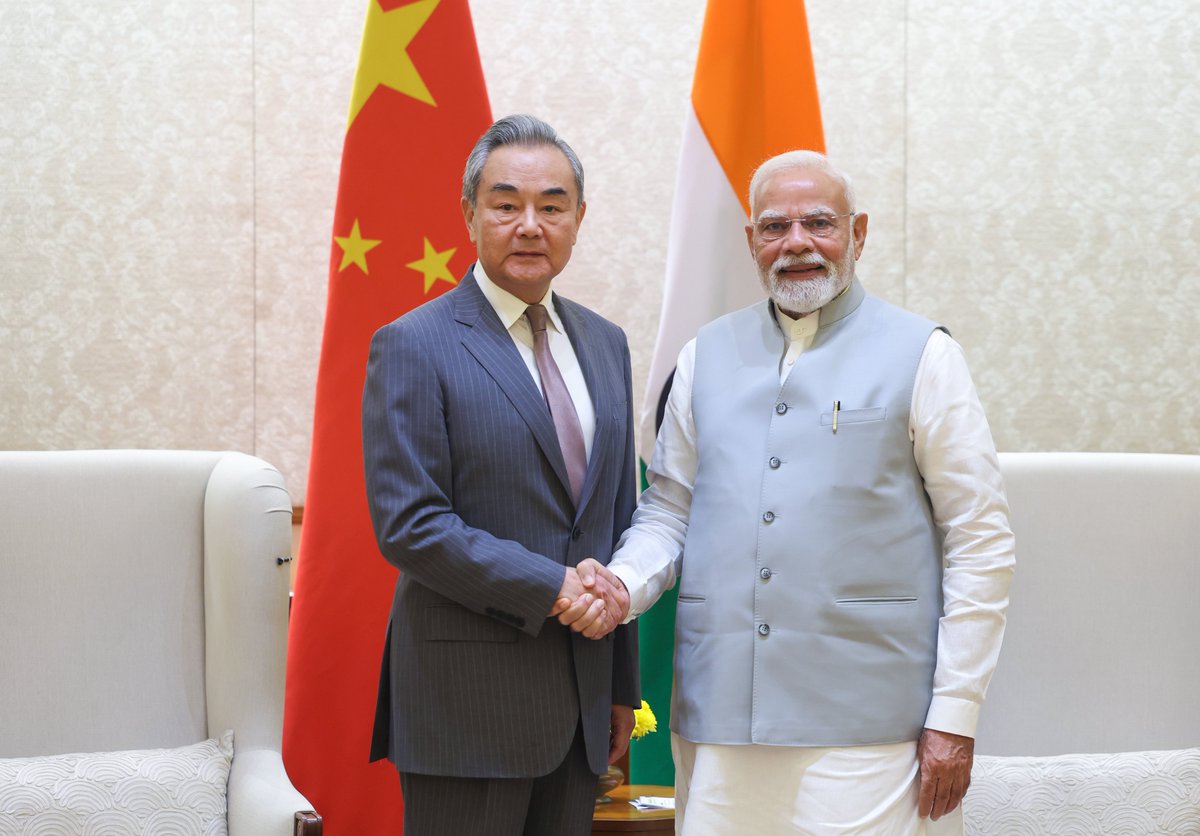 Chinese FM Wang Yi meets Indian PM Modi in Delhi